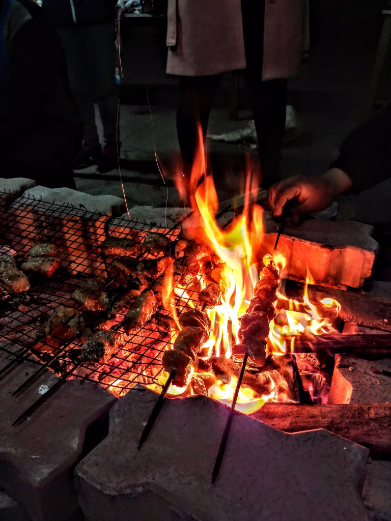 Chicken Skewers on Open Flames